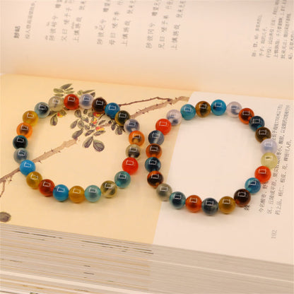 Pulsera de cuentas de ágata de caramelo de colores Mythstone con poder curativo