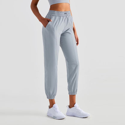 Pantalones deportivos de yoga y fitness de cintura alta Mythstone con bolsillos 