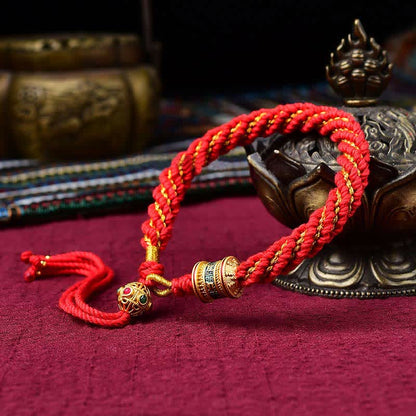 Pulsera de hilo tejido con amuleto de la suerte Thangka tibetano Mythstone hecha a mano