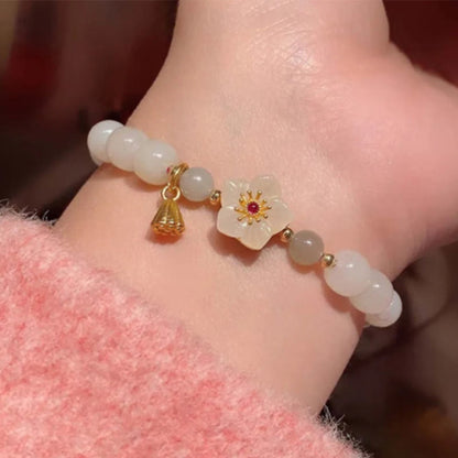 Pulsera de bendición de la suerte con perla y flor de durazno de jade Mythstone