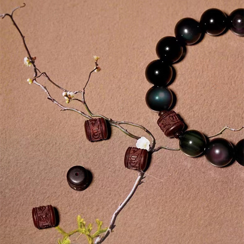 Pulsera curativa con personaje Om Mani Padme Hum Fu y obsidiana arcoíris con brillo dorado natural de Mythstone 