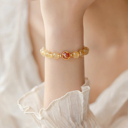 Pulsera de protección con estrellas de cuarzo fresa y cuarzo rutilado dorado Mythstone 