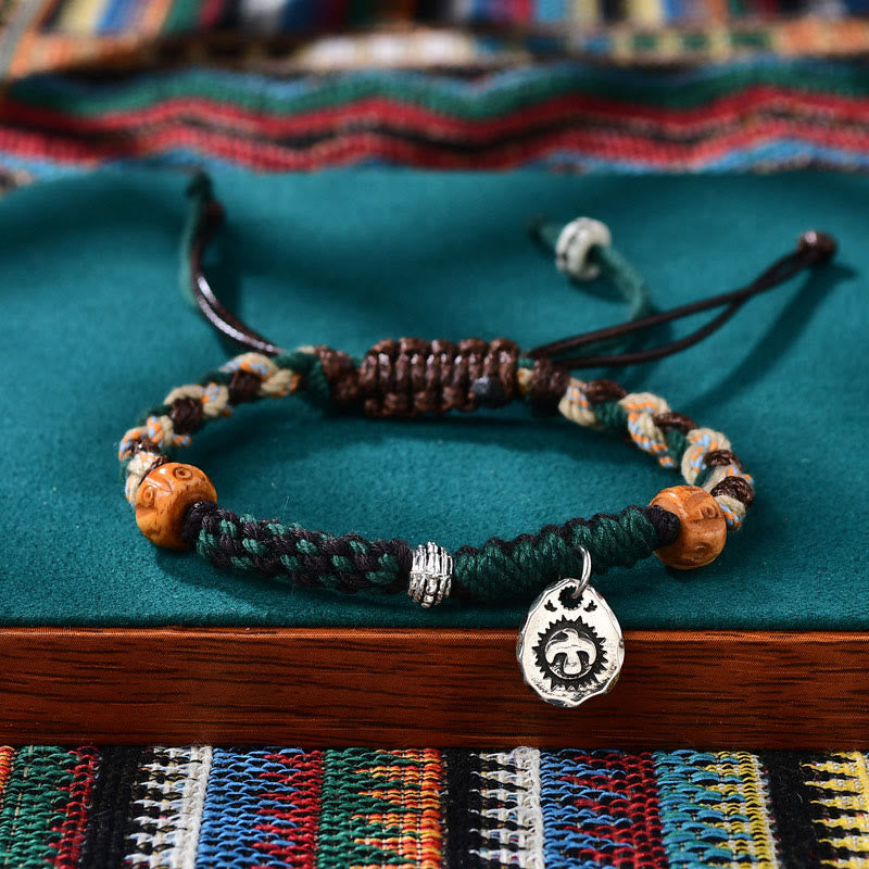 Pulsera de cuerda de la riqueza con cuentas tibetanas Dzi y hueso de yak de ágata