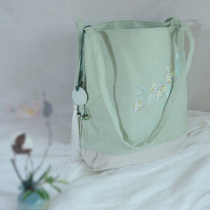 Bolso de mano de lona de gran capacidad con bordado de flores de ciruelo y grulla de Mythstone