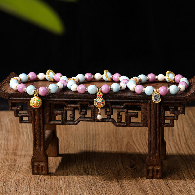 Pulsera de protección con cuentas de porcelana y ceniza de incienso de cristal de Liuli con cabeza de león y conejo, diosa de la riqueza tibetana Zakiram