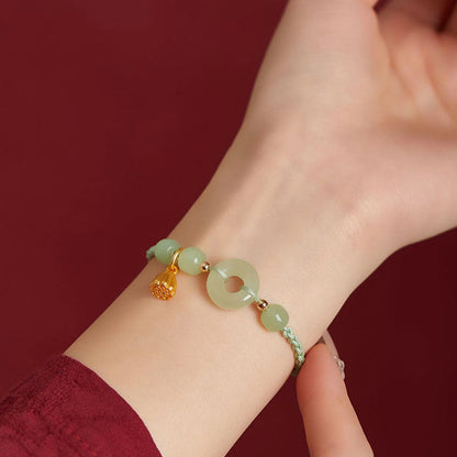 Pulsera de hilo con hebilla de paz redonda de piedra mitológica con loto de jade, felicidad, abundancia y riqueza