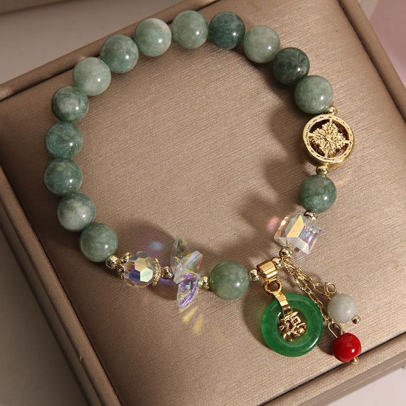 Pulsera curativa con dijes de personaje de jade y cuarzo fresa Mythstone 