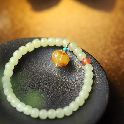 Pulsera de prosperidad con cristal de ágata roja, ámbar y calabaza de jade hetiano natural