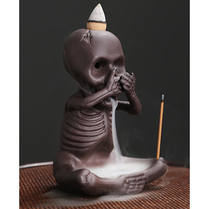 Quemador de incienso de arcilla morada con forma de calavera fantasma de Mythstone, fuente de humo con reflujo, decoración de la paz