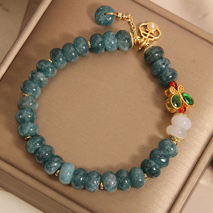 Pulsera de la abundancia con cuentas de ábaco en forma de mariposa y ágata blanca de jade Mythstone 