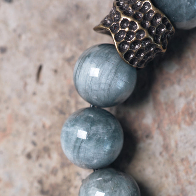 Pulsera de pareja de cobre, madera de ébano y piedra de ojo de águila de MythStone