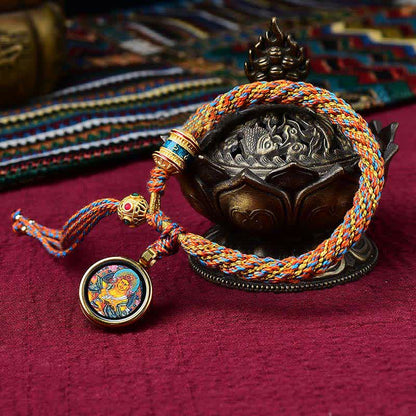 Pulsera de hilo tejido con amuleto de la suerte Thangka tibetano Mythstone hecha a mano