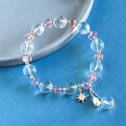 Pulsera con dije de estrella protectora de cristal blanco y rosa Mythstone