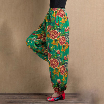 Pantalones harén con estampado de flores rojas y verdes de estilo étnico Mythstone y bolsillos 