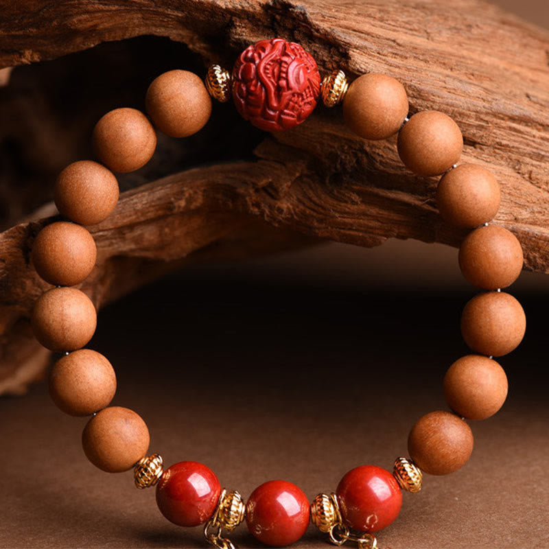 Pulsera de borlas de riqueza PiXiu con cinabrio de madera de melocotón natural tibetano Mythstone 