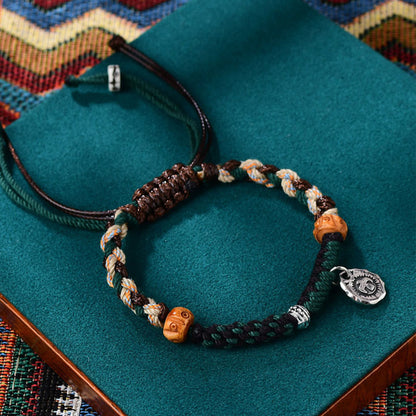 Pulsera de cuerda de la riqueza con cuentas tibetanas Dzi y hueso de yak de ágata