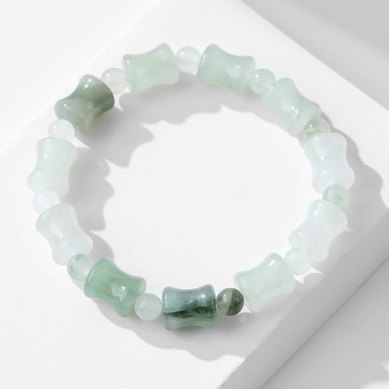 Pulsera de la suerte de la abundancia con diseño de cáscara de coco y bambú de jade Mythstone