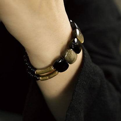 Pulsera reforzada con obsidiana negra y brillo dorado de Mythstone 