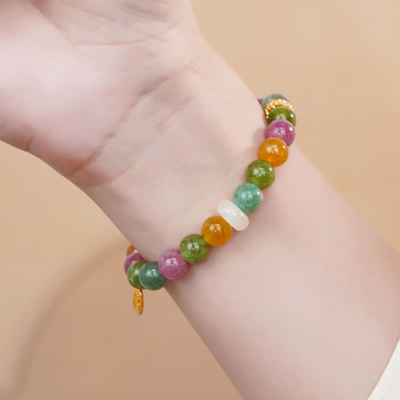 Pulsera con dijes de turmalina y calcedonia de colores Mythstone con carácter positivo Fu