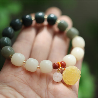 Pulsera de ámbar con semillas de bodhi y loto de la paz con degradado Mythstone