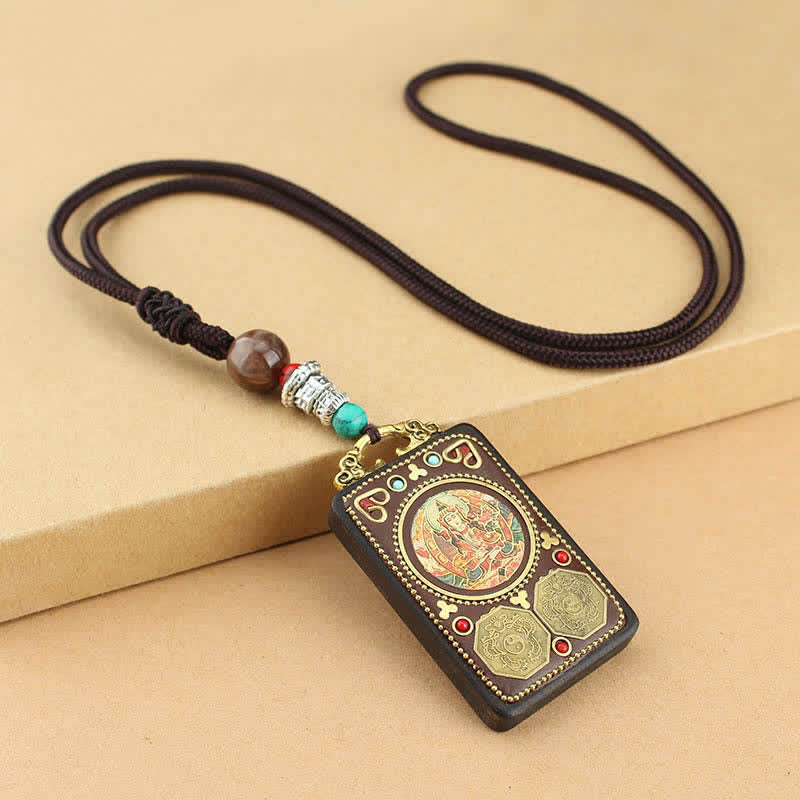 Colgante de collar de ébano con la paz y el dios de la riqueza del Thangka del Tíbet de Mythstone 