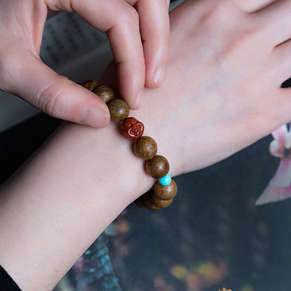 Mythstone Tarakan Agarwood Amber Red Agate Laughing Buddha Strength Meditation Bracelet