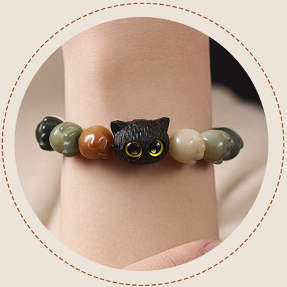 Pulsera de la suerte con forma de gato de la sabiduría y semillas de Bodhi naturales de Mythstone con forma de pata encantadora de madera de ébano 