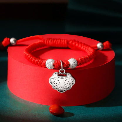 Pulsera trenzada hecha a mano para niños con dije de candado chino en plata de ley 925 de Mythstone con hilo rojo multicolor