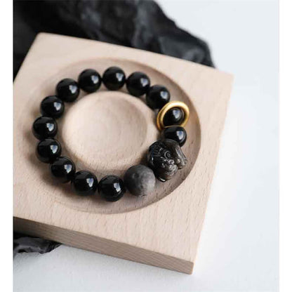 Pulsera de fuerza con león de obsidiana plateada y brillo de obsidiana negra Mythstone