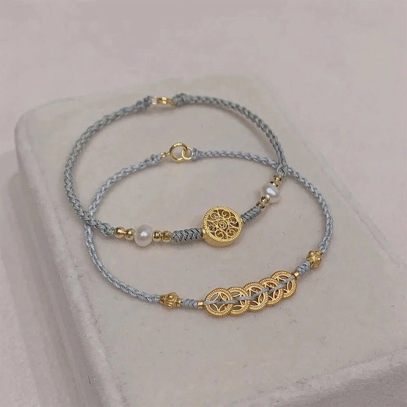 Pulsera trenzada con cuerda azul y perla de la suerte y árbol de la fortuna con monedas de cobre de Mythstone 