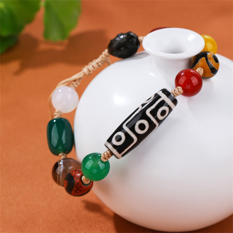 Pulsera de protección de riqueza de ágata con cuentas Dzi tibetanas de nueve ojos Mythstone 