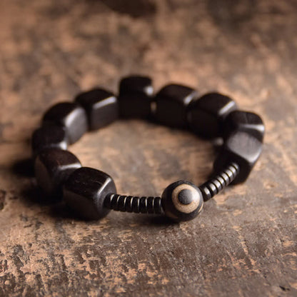 Mythstone Tibetan Ebony Wood Dzi Bead Strength Bracelet