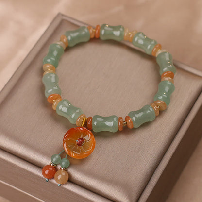 Pulsera de la suerte con diseño de flor de bambú y jade natural de Mythstone