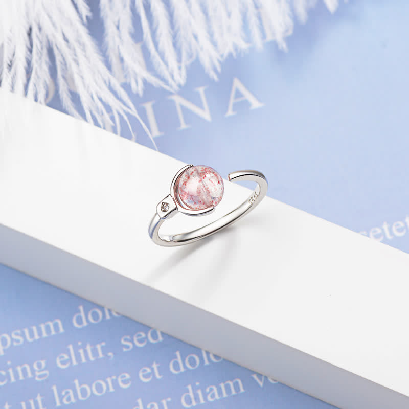 Anillo giratorio relajante de cristal rosa Mythstone 