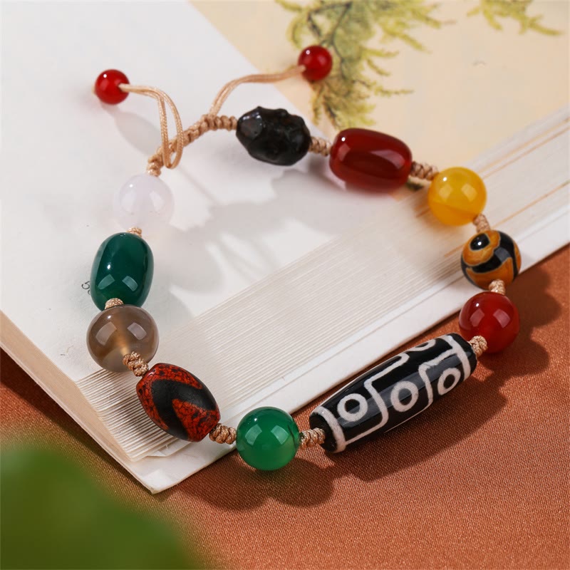 Pulsera de protección de riqueza de ágata con cuentas Dzi tibetanas de nueve ojos Mythstone 