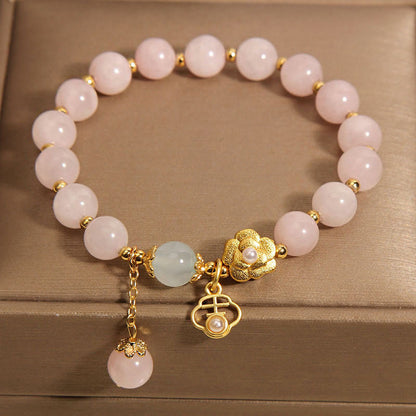 Pulsera de la suerte con flor de cristal rosa natural Mythstone