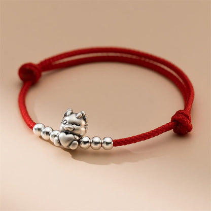 Pulsera roja con la suerte del año del dragón en plata de ley 999 hecha a mano por Mythstone