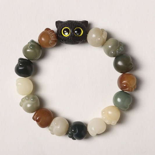 Pulsera de la suerte con forma de gato de la sabiduría y semillas de Bodhi naturales de Mythstone con forma de pata encantadora de madera de ébano 