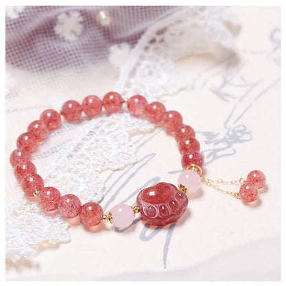 Pulsera de la suerte con forma de pata de gato y cuarzo fresa natural de Mythstone con cristal rosa 