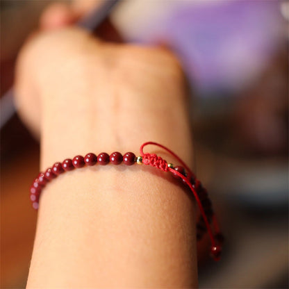 Pulsera trenzada con hilo rojo y bendición de cinabrio natural Mythstone 