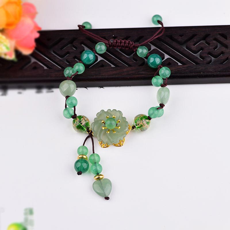 Pulsera de jade verde natural con flor colgante y suerte de Mythstone