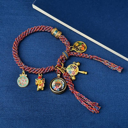 Pulsera trenzada de hilo de la suerte Thangka de la diosa de la riqueza Zakiram de Tara verde tibetana Mythstone 