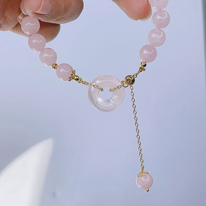 Pulsera con dije de amor y hebilla de paz de cristal rosa natural Mythstone