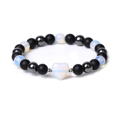 Pulsera de protección con corazón de amor y cristal de ojo de tigre y ónix negro Mythstone 