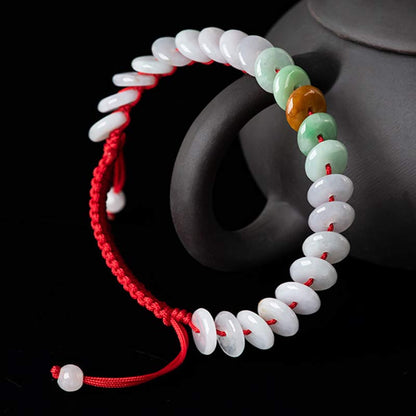 Pulsera tejida con hilo rojo de la suerte y jade redondo Mythstone