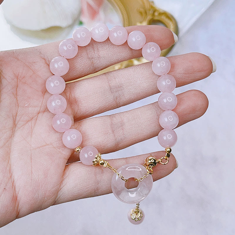 Pulsera con dije de amor y hebilla de paz de cristal rosa natural Mythstone