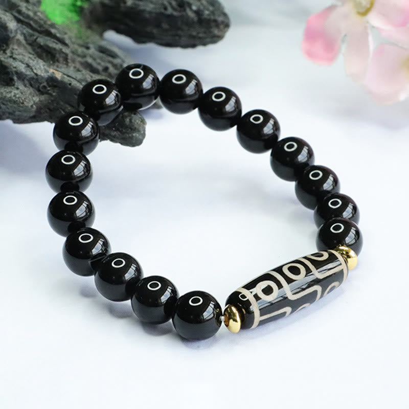 Pulsera de poder de ónix negro con cuentas tibetanas Dzi de nueve ojos Mythstone