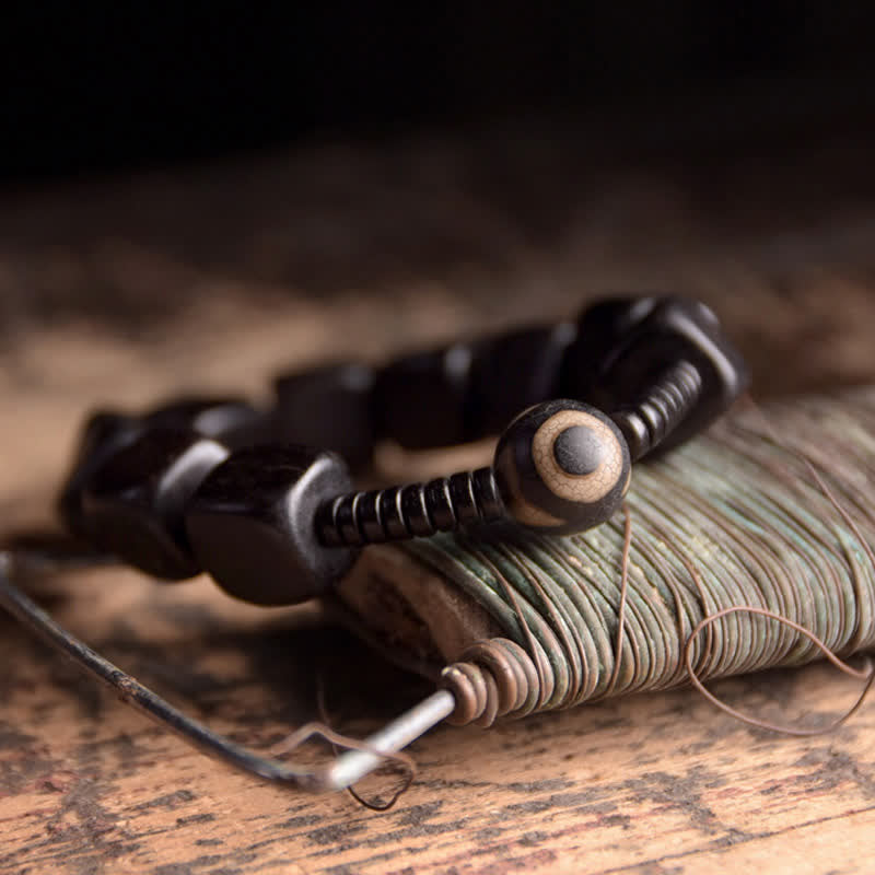 Mythstone Tibetan Ebony Wood Dzi Bead Strength Bracelet