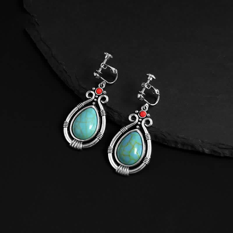 Pendientes colgantes con clip y diseño de gota de agua de turquesa vintage del Tíbet de Mythstone