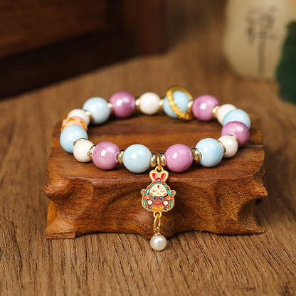 Pulsera de protección con cuentas de porcelana y ceniza de incienso de cristal de Liuli con cabeza de león y conejo, diosa de la riqueza tibetana Zakiram